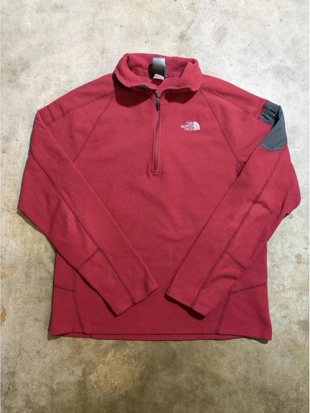 North face red quarter zip with arm pocket size M